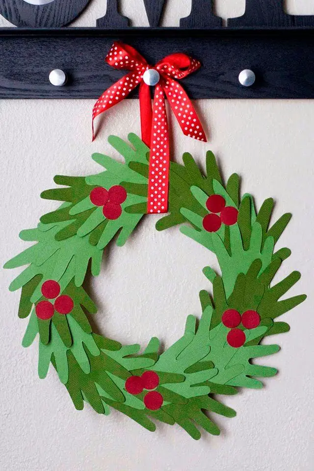 paper wreath made from hand-shaped cutouts