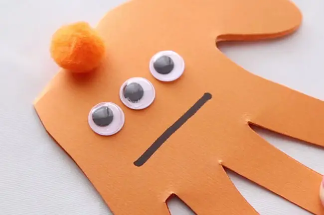 orange monster handprint craft