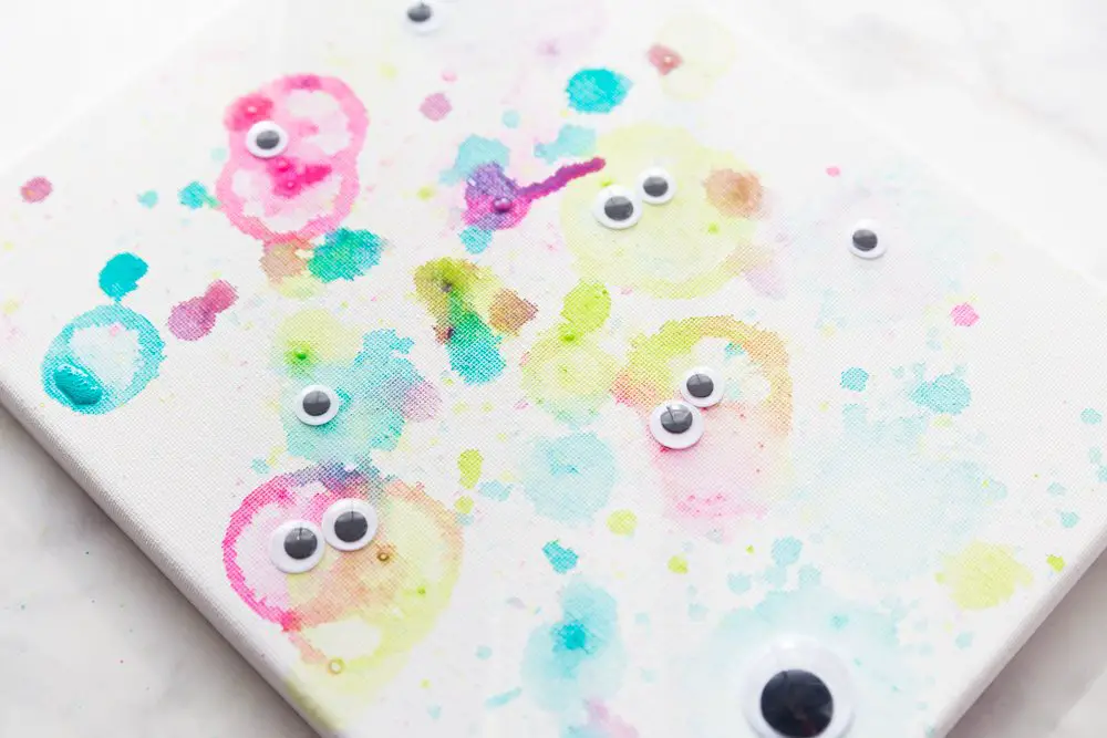 bubble-painted monsters on a canvas