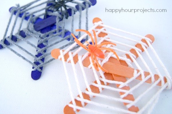 Halloween-Themed Popsicle Stick Spiderwebs