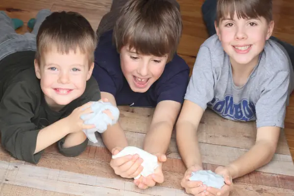 Kids holding flubber